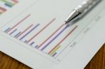 Business Graph And Pen Stock Photo