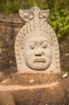 Statue Of Ancient Khmer Warrior Head At Angkor Wat Stock Photo