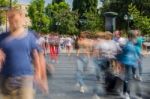 Blurry People Walking In The Street Stock Photo