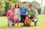 Family Posing To The Camera Stock Photo