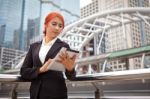 Woman With Tablet At Modern City Stock Photo