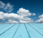 Blue Plank And Cloudy Sky Stock Photo