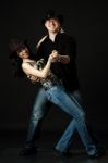 Handsome Young Couple Dancing In Studio Stock Photo