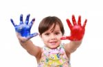 Beautiful Little Girl With Her Hands In The Paint Stock Photo