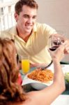 Couple Toasting Stock Photo