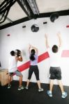 Man And Woman Doing Crossfit On Gym Stock Photo