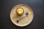 Portuguese Egg Tart On A Wood Dish Stock Photo