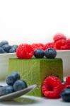 Green Tea Matcha Mousse Cake With Berries Stock Photo