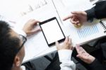 High Angle View Of Business Colleagues Using Blank Screen Digita Stock Photo