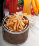 Fresh French Fries On A Bucket Stock Photo