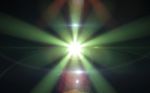 Anamorphic Green Lens Flare Isolated On Black Background For Overlay Design Or Screen Blending Mode Stock Photo