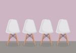 Four White Modern Chair Stock Photo