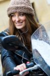 Pretty Young Woman Over A Motorcycle On The Street Stock Photo