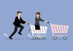 Business Man And Woman Are Shopping With A Cart Stock Photo