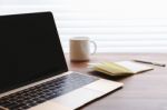 Laptop On Office Desk Stock Photo