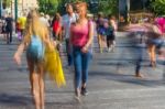 Blurry People Walking In The Street Stock Photo