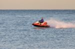 Dungeness, Kent/uk - December 17 ; Man Riding A Jet Ski Off Dung Stock Photo