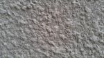 White Knobby Cement Wall Stock Photo