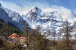 Temple On The Snow Mountains In Yading Stock Photo