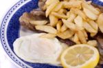 Fried Potatoes With Egg And Meat Stock Photo