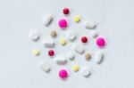 Top View Of The Pills On The White Background, The Drug And Capsule Pills On The Floor Stock Photo