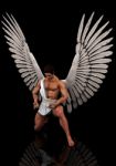 Male Angel Kneeling Down Stock Photo