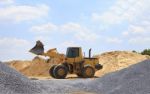 Yellow Tractor On Construction Site Stock Photo