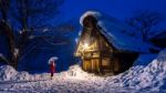 Young Woman In Shirakawa-go Village In Winter, Unesco World Heritage Sites, Japan Stock Photo