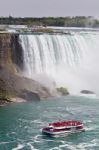 Beautiful Picture With A Ship And Amazing Niagara Waterfall Stock Photo