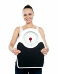 Woman Holding Weighing Scales Stock Photo