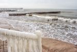 Breakwater Covered By Ice Stock Photo