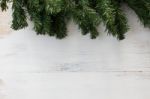 Branch Of Fir Tree,christmas Leaf On Wooden Floor Background  Stock Photo