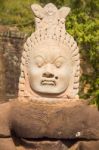 Statue Of Ancient Khmer Warrior Head At Angkor Wat Stock Photo