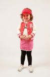 Little Girl Fashion Model With Red Cap Stock Photo