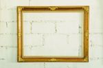 Vintage Gold Picture Frame On White Wall Stock Photo