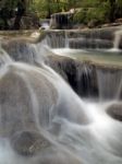 Waterfall With Water Flowing Around Stock Photo