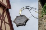 Ornate Hanging Sign For Landwehr-brau In Rothenburg Stock Photo