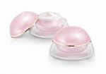 Two Pink Dome Cosmetic Jar On White Background Stock Photo