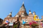 Buddha Statue And Ancient Pagoda Stock Photo