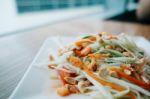 Papaya Salad. Traditional Spicy Thai Food Stock Photo