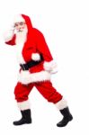 Senior Man In Santa Dress Dancing Over White Stock Photo