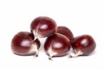 Chestnuts Isolated On A White Background Stock Photo