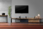 Led Tv On Concrete Wall With Wooden Furniture In Living Room Stock Photo