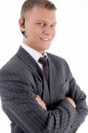 Close View Of Young Executive With Blue Tooth Stock Photo