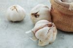 Garlic On The Floor Stock Photo