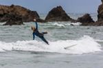 Surfing At Bude In Cornwall Stock Photo