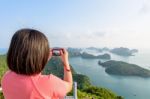 Woman On Peak Take Photos Stock Photo