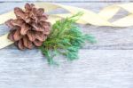 Pine Cones On Wood Background Stock Photo