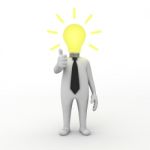 Businessman With Light Bulb Idea Stock Photo