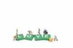 Miniature Worker Team Building Word Love On White Background Stock Photo